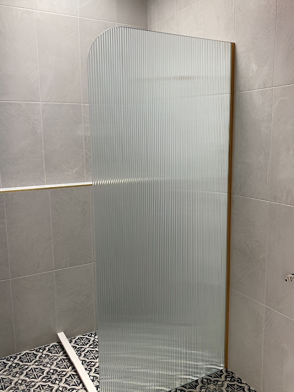 A Shower Stall With a Striped Glass Door in a Bathroom — Canobolas Glass Service In Orange, NSW