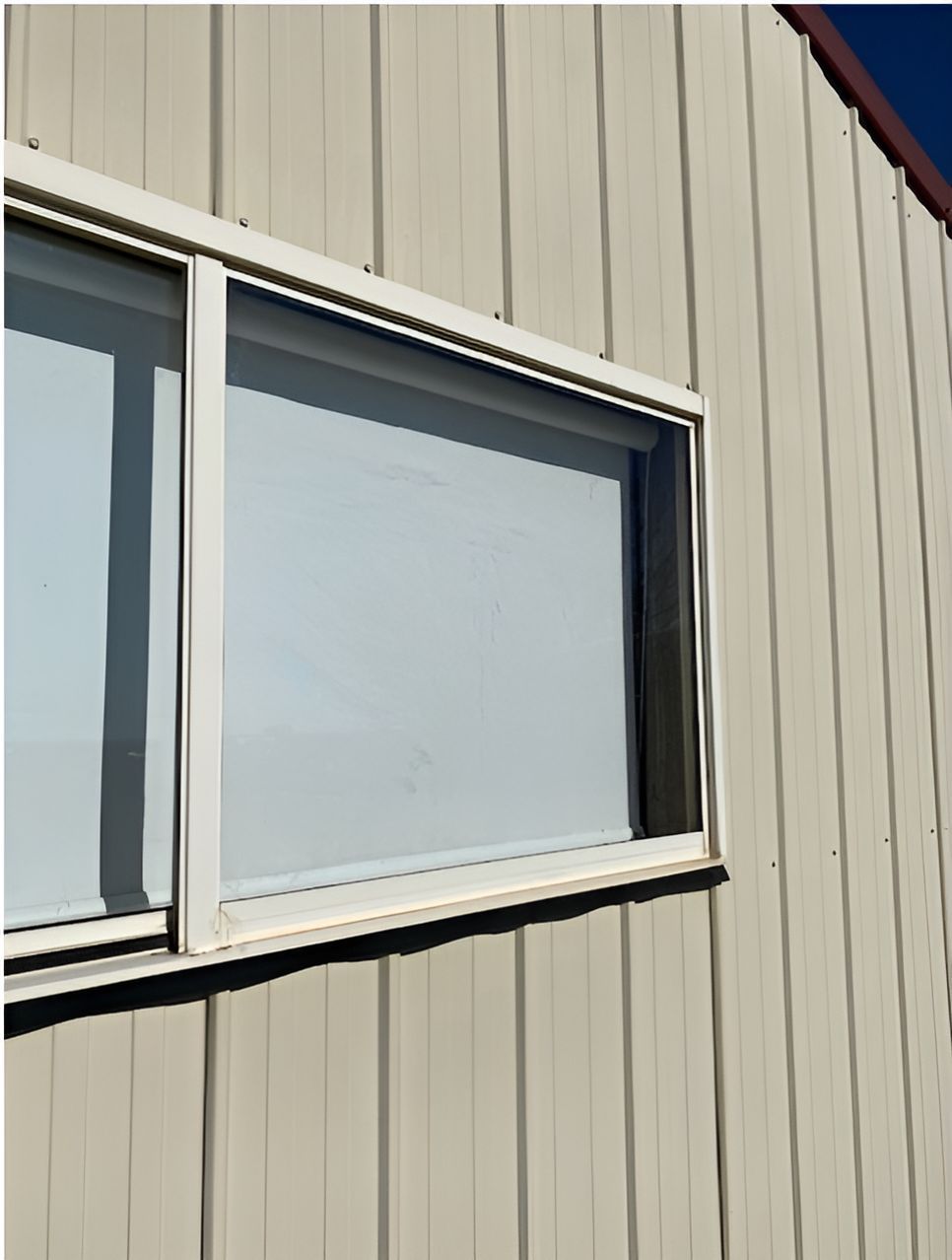 Window with a cream colored frame installed on shed — Canobolas Glass Service In Orange, NSW