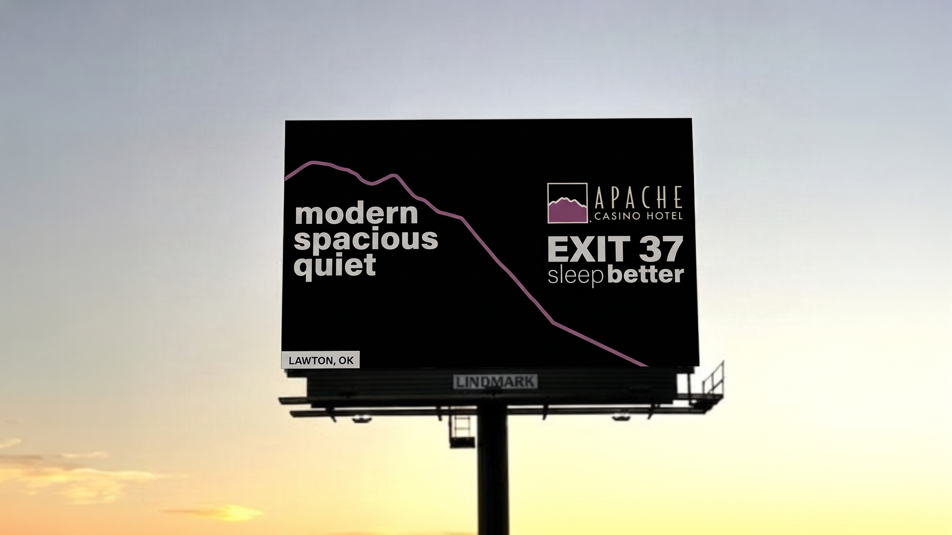 Apache Casino Hotel billboard with the words modern spacious quiet - it was marketing the hotel.