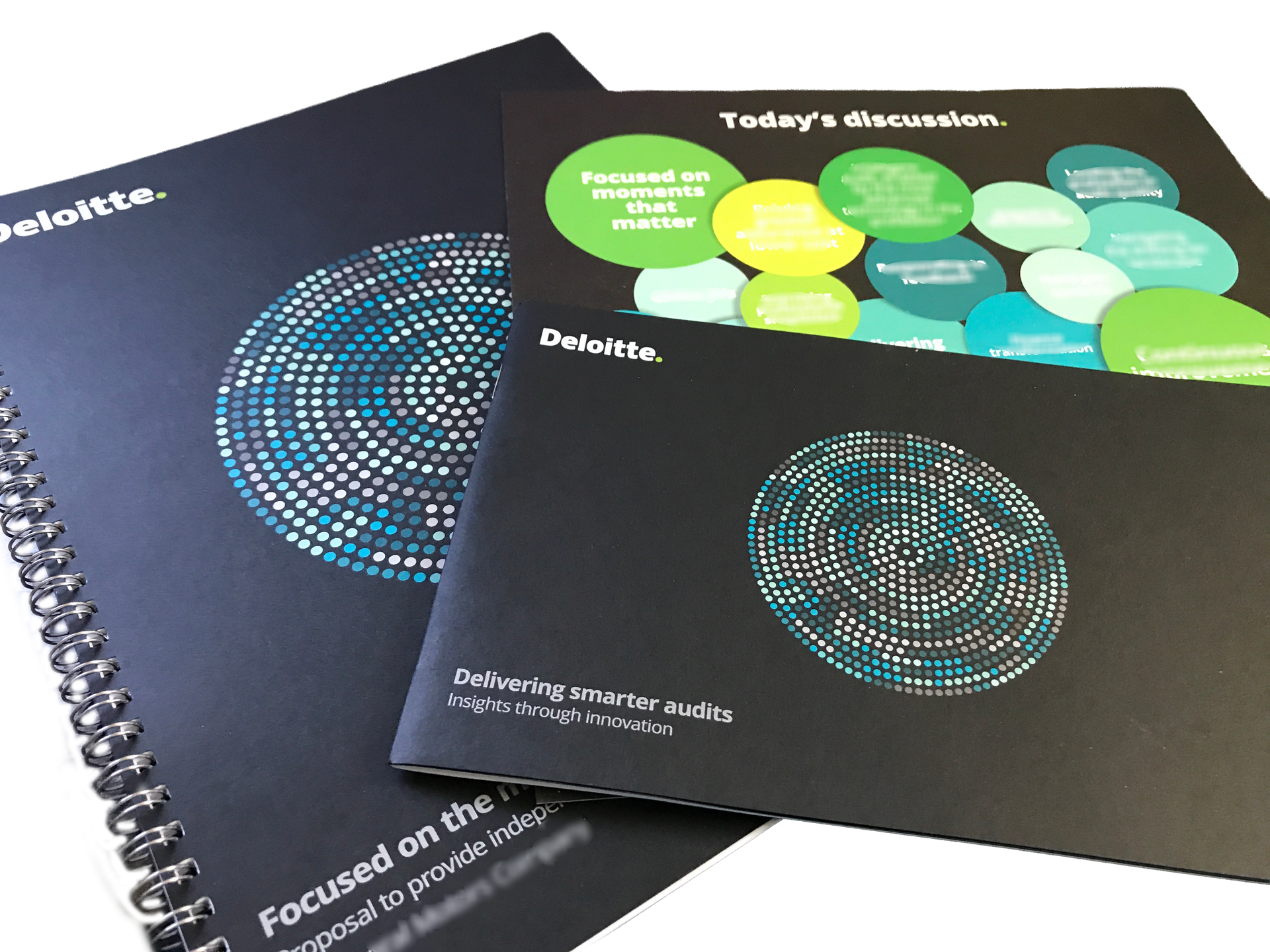 Two Deloitte-branded documents on a dark background: a spiral-bound notebook and a presentation folder with green circles.