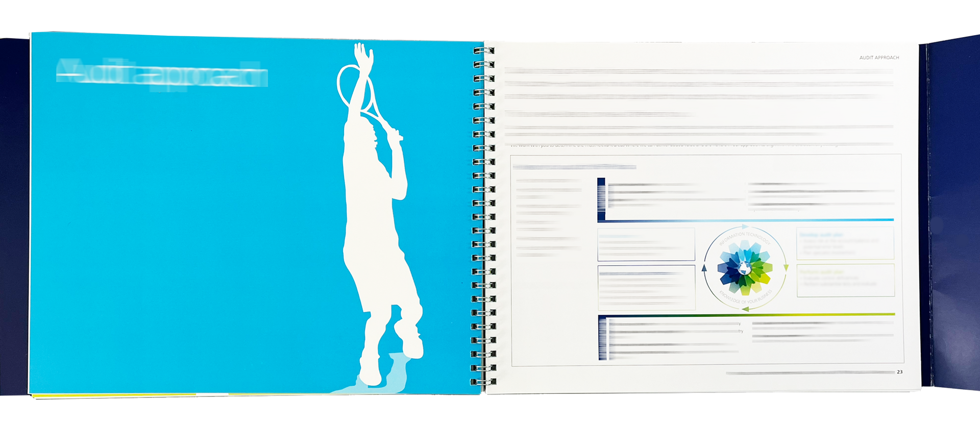 Open spiral notebook with blue and white pages, fish graphic, and “Genius in information” text