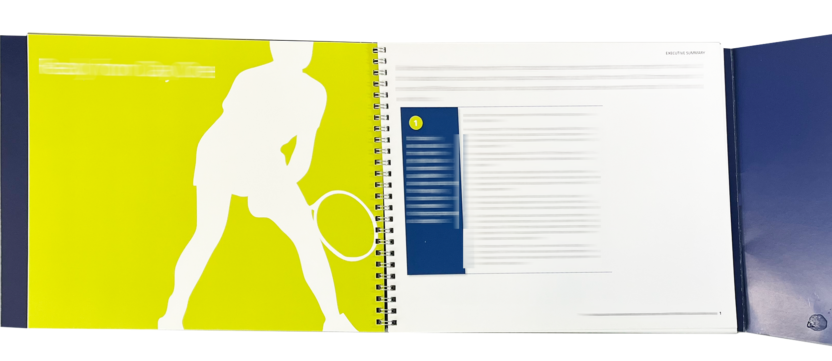 Open spiral notebook with blue and white pages, fish graphic, and “Genius in information” text