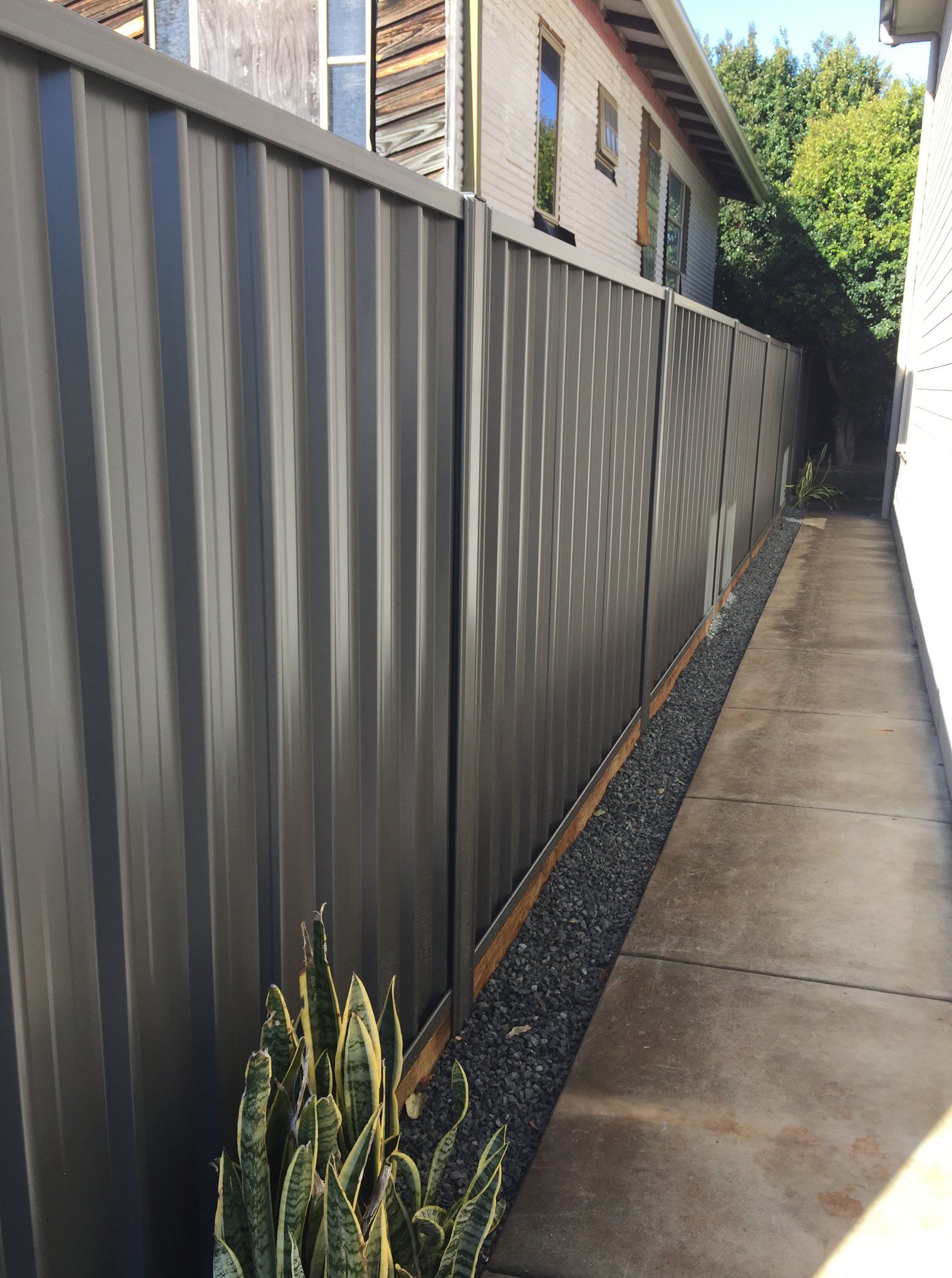 A Wooden Fence With a Gate in the Middle of It — Aztech Fencing In Upsalls Creek, NSW