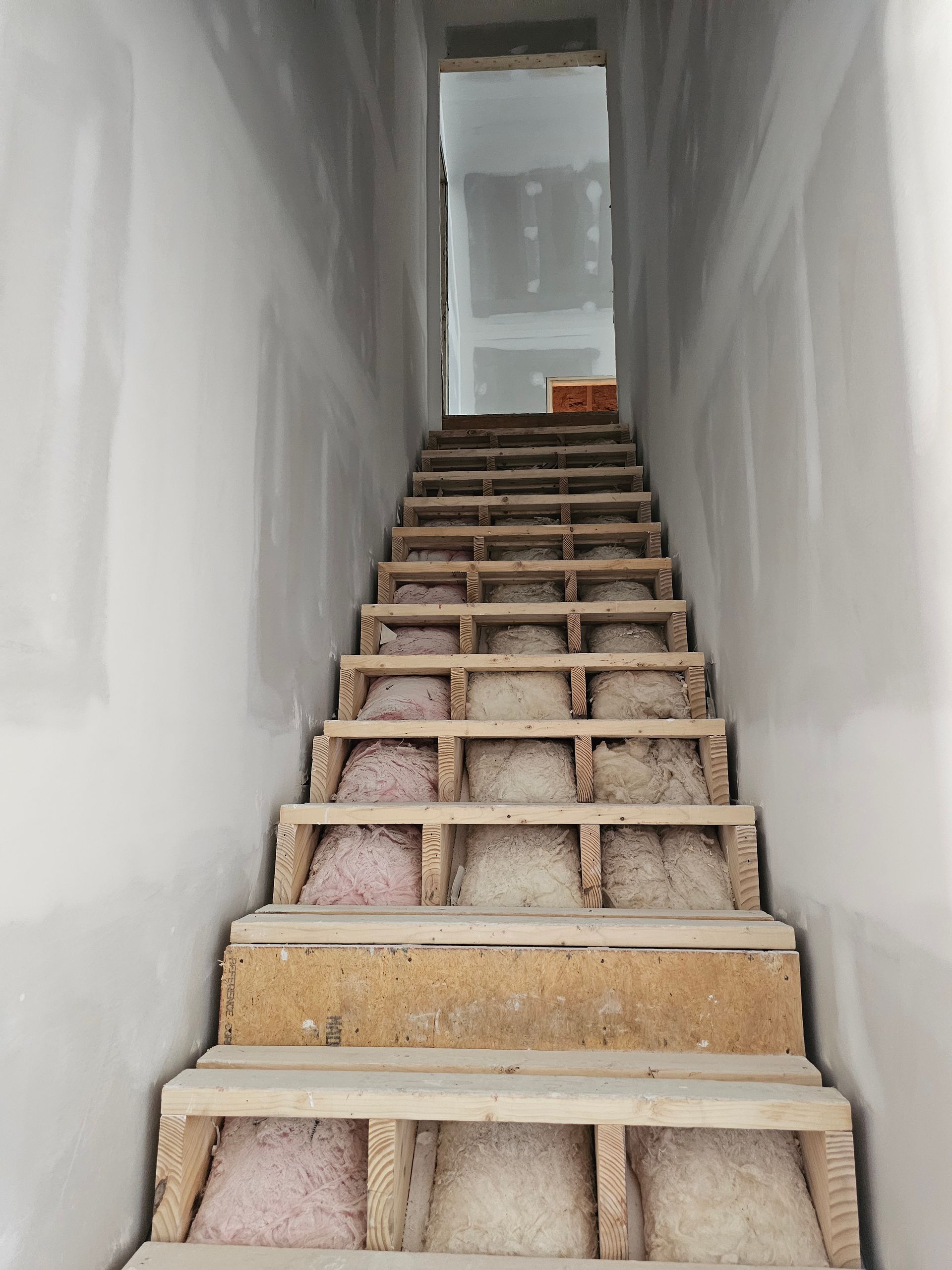 A set of stairs that are being built in a building.