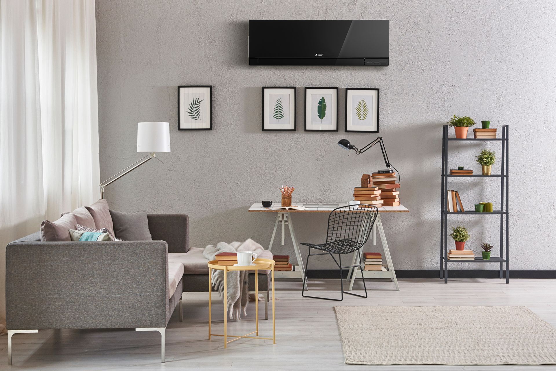 Living room with gray sofa, desk, shelving, art, and air conditioning unit.— Elements Air & Refrigeration In Westcourt, QLD