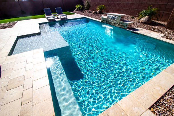A rectangular swimming pool with a concrete deck in Columbia.