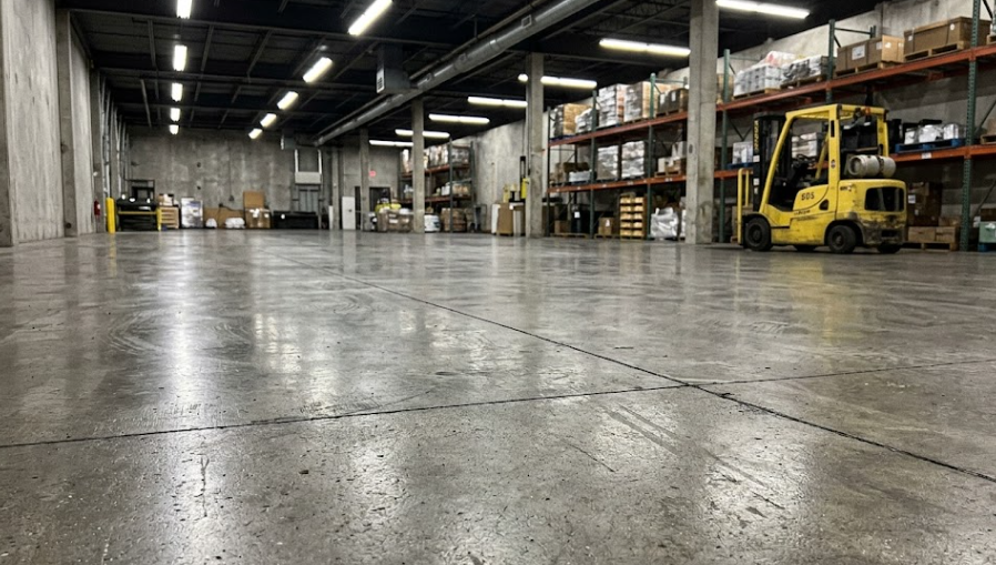 Smooth and durable commercial concrete floors inside a Columbia MD warehouse.