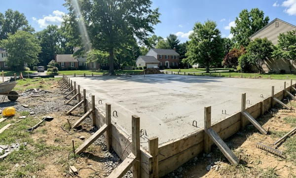 Freshly poured residential concrete foundation installation in Columbia MD.