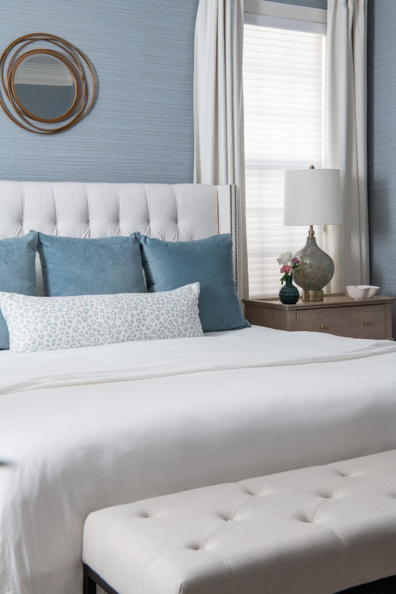 A bedroom with a bed , nightstand , lamp and mirror - Charlotte, NC