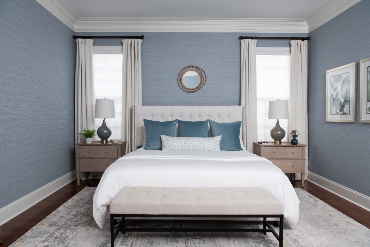 A bedroom with a bed , nightstands , lamps and a bench - Charlotte, NC