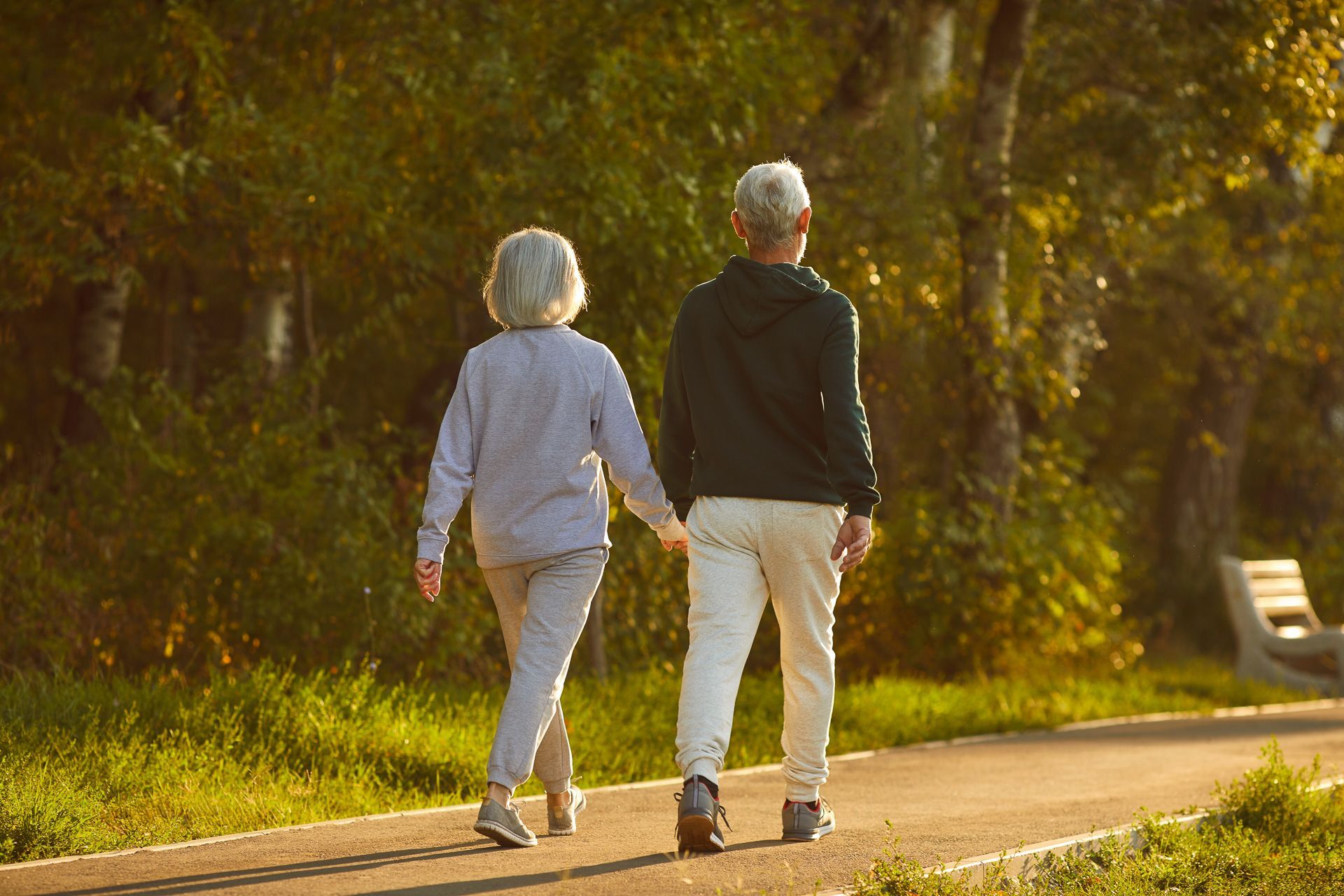 Old Couple Hugging and Looking at Each Other