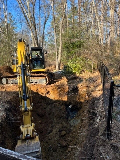 Two Man Repairing The Septic Cover — Andover, MA — Bateson Enterprises