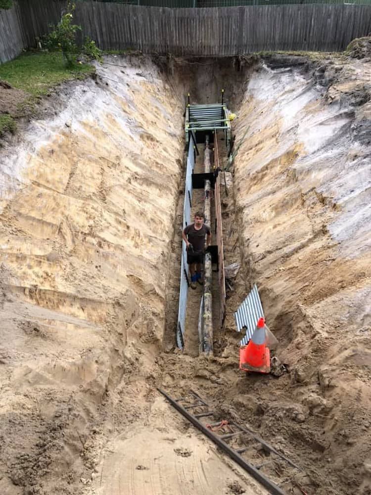 A Man is Sitting in a Trench in the Dirt — BeCivil in Tomerong, NSW