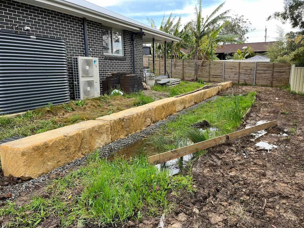 A House With a Brick Wall and a Wooden Fence in the Backyard — BeCivil in Tomerong, NSW
