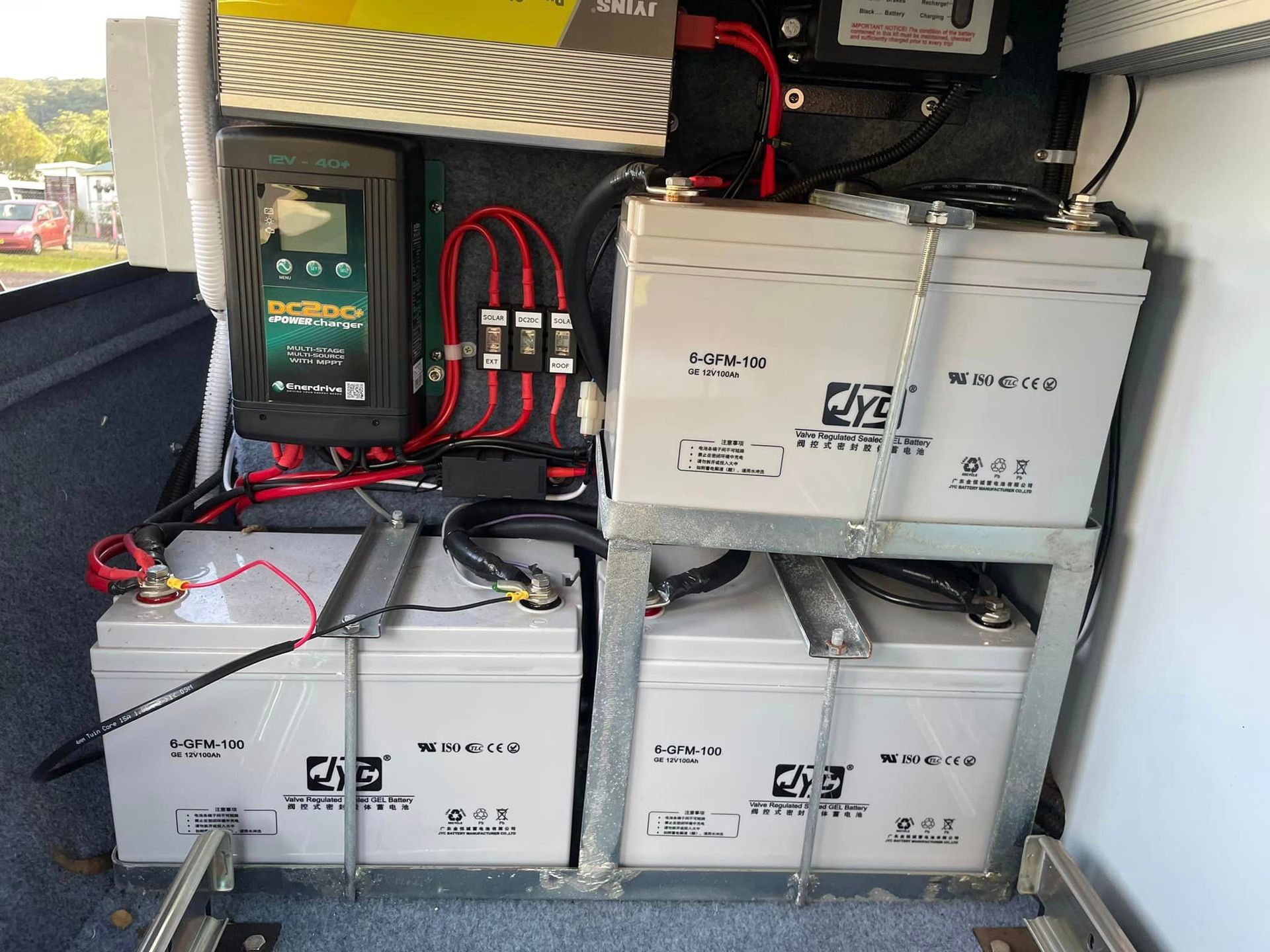 A Bunch Of Batteries Are Stacked On Top Of Each Other — Coast 2 Coast Batteries in Central Coast, NSW