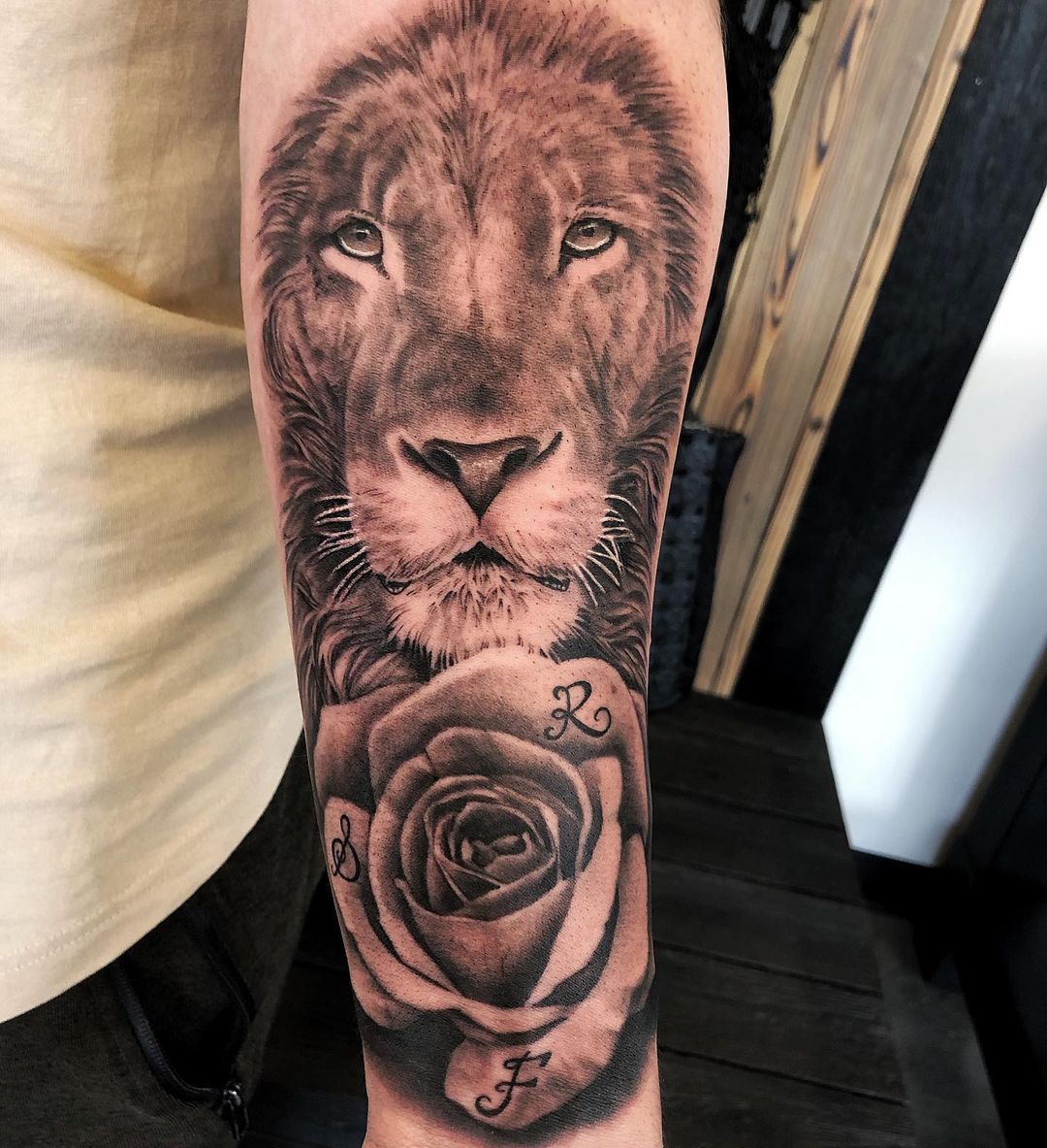 Lion and Rose Tattoo by Chad Lavers at Crimson Empire Tattoo in Edmonton Alberta Canada