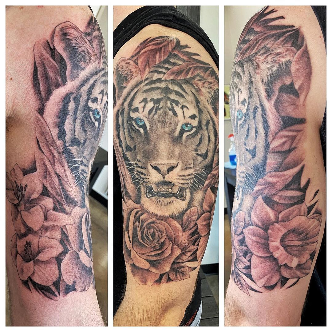 Tiger and Rose Tattoo by Chad Lavers at Crimson Empire Tattoo in Edmonton Alberta Canada