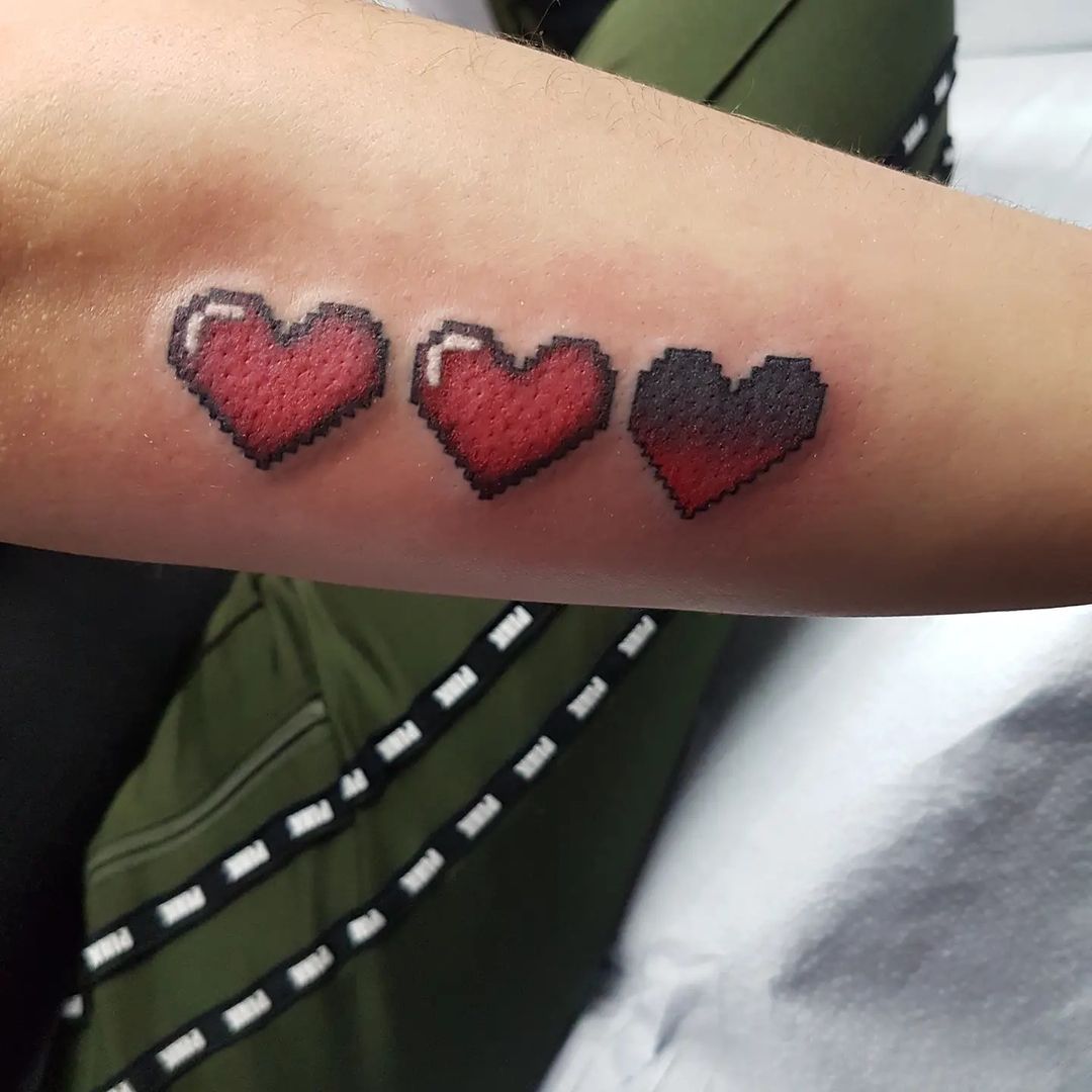 Legend of Zelda Hearts Tattoo by Wen at Crimson Empire Tattoo in Edmonton Alberta Canada