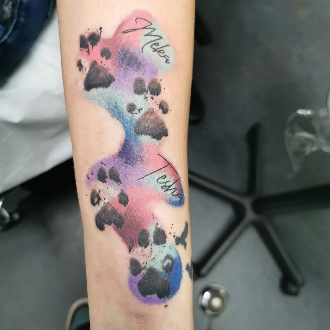 Paw Prints and Script Tattoo by Wen at Crimson Empire Tattoo in Edmonton Alberta Canada