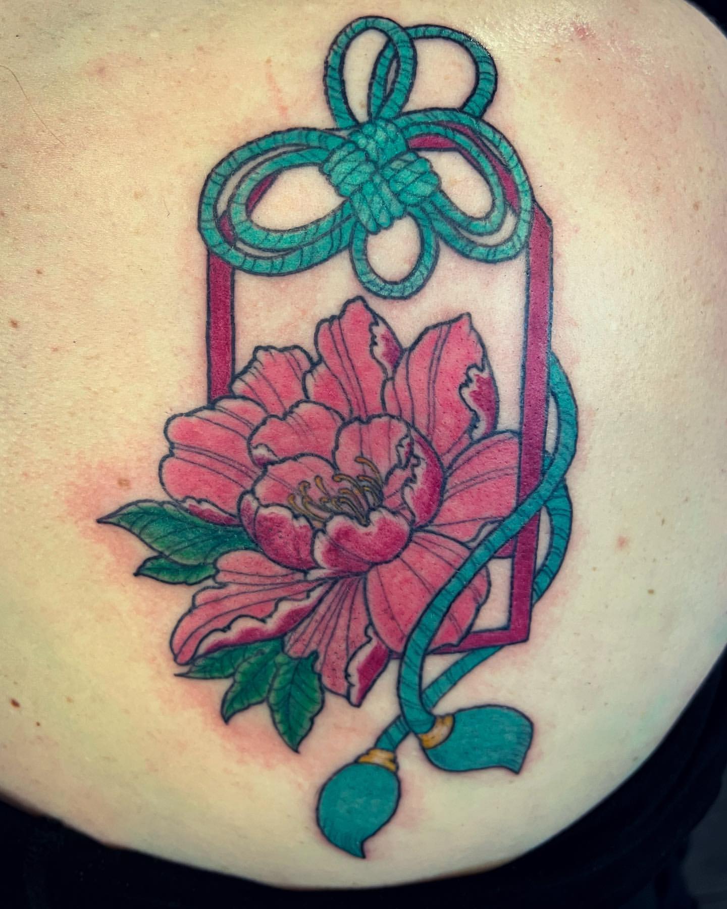 Peony Omamori Charm Tattoo by Vinny Nguyen at Crimson Empire Tattoo in Edmonton Alberta Canada
