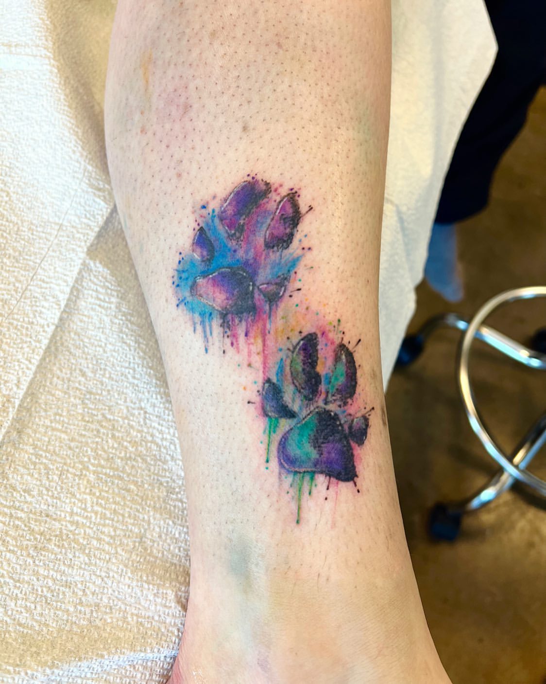 Pawprints Tattoo by Vinny Nguyen at Crimson Empire Tattoo in Edmonton Alberta Canada