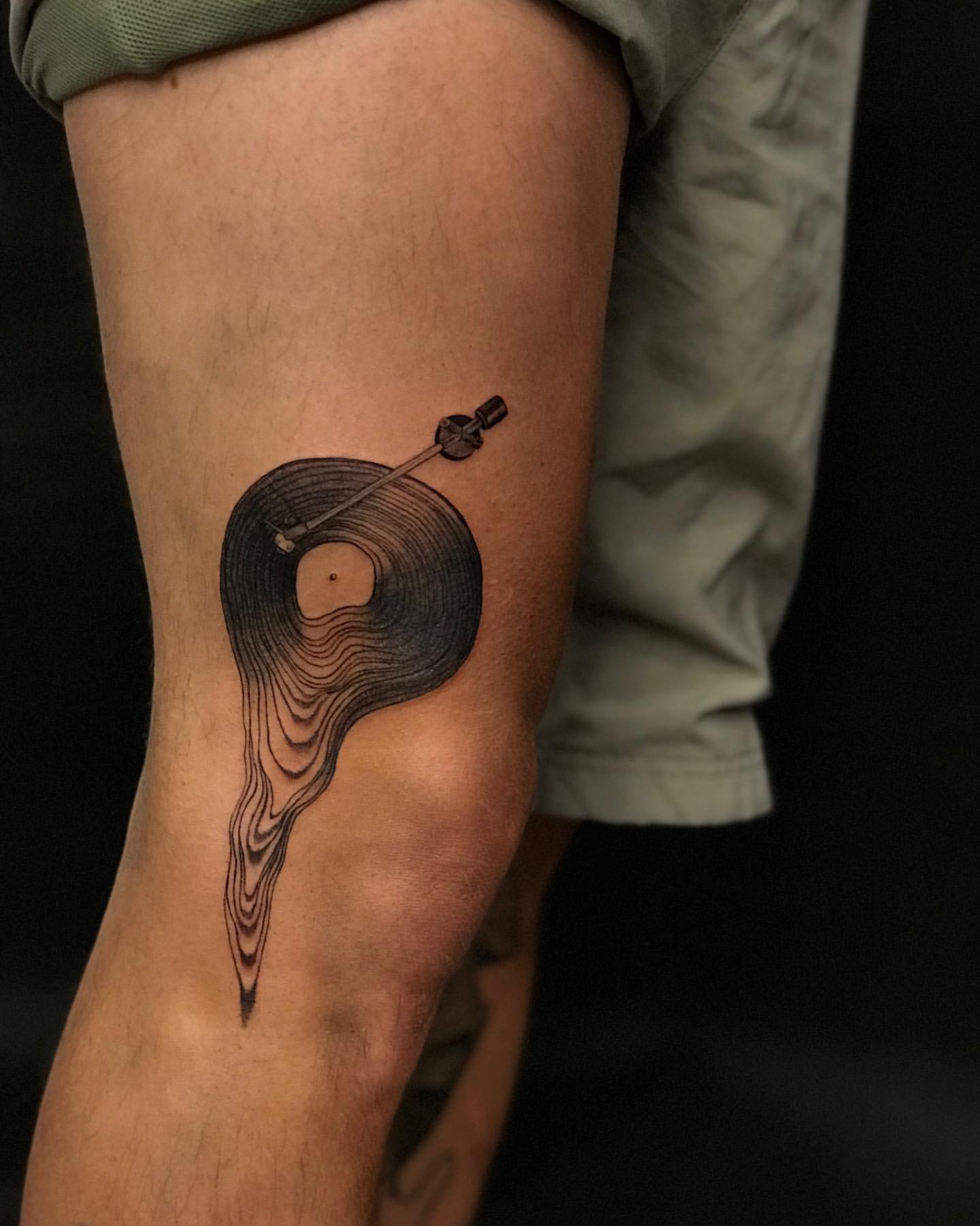 Vinyl Record Tattoo by Anastasiya at Silver Ghost Tattoo in Edmonton Alberta Canada