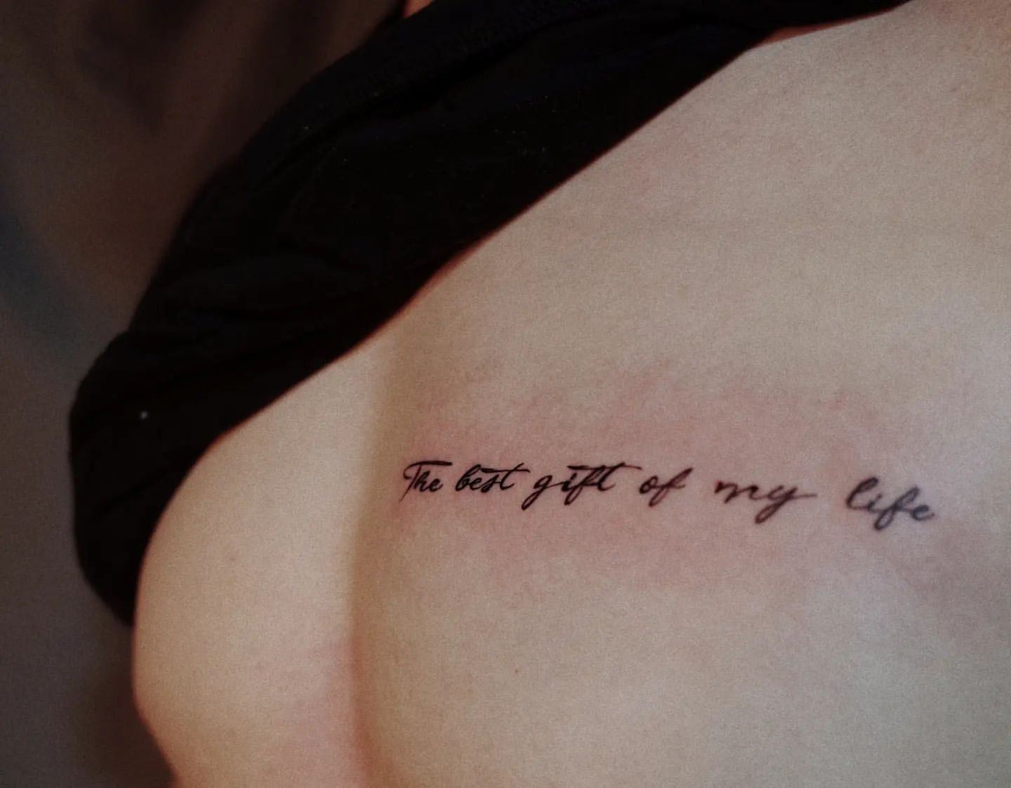 Writing Tattoo by Ian Wang at Black Gold Tattoo Co in Edmonton Alberta Canada