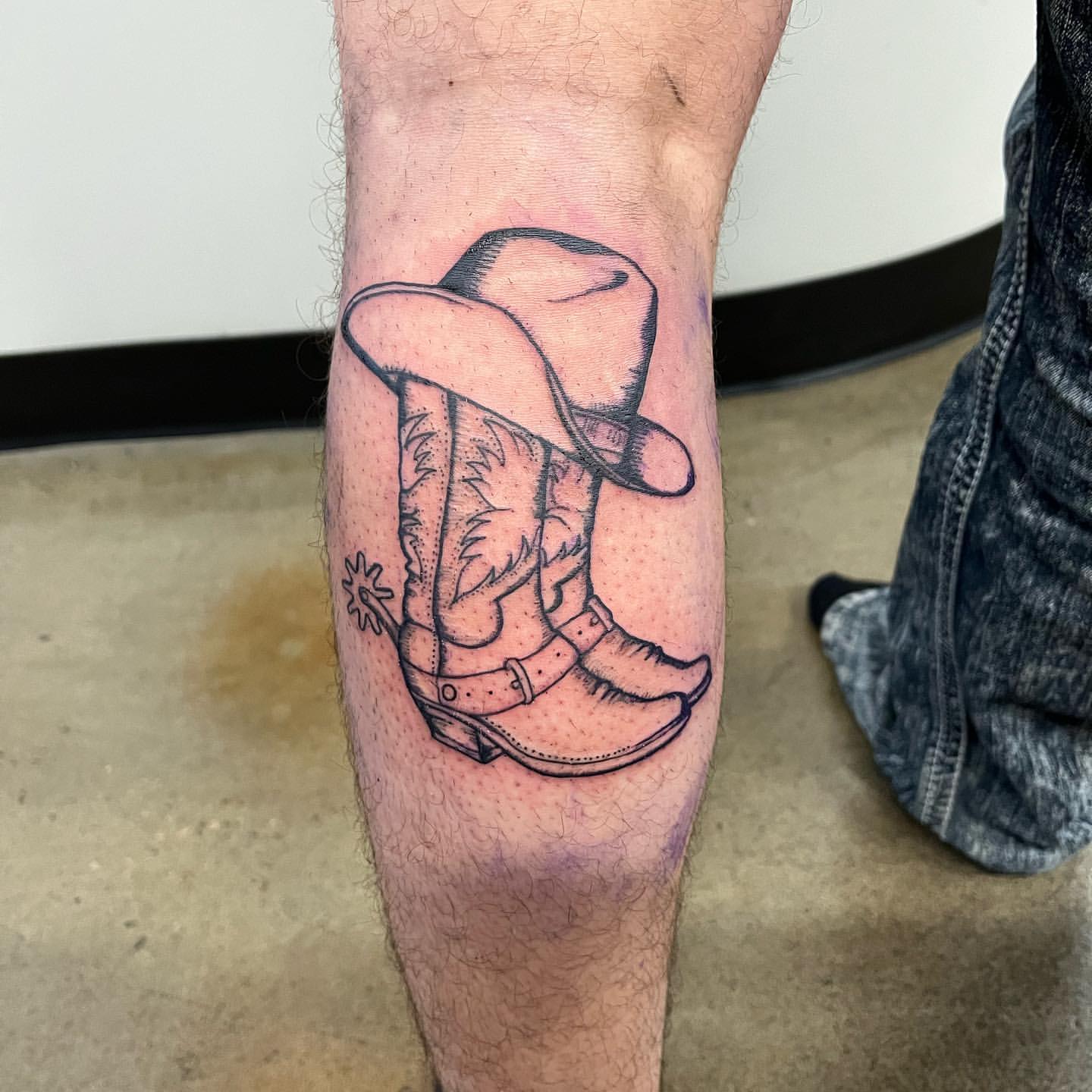 Cowboy Boots and Hat Tattoo by Vinny Nguyen at Crimson Empire Tattoo in Edmonton Alberta Canada