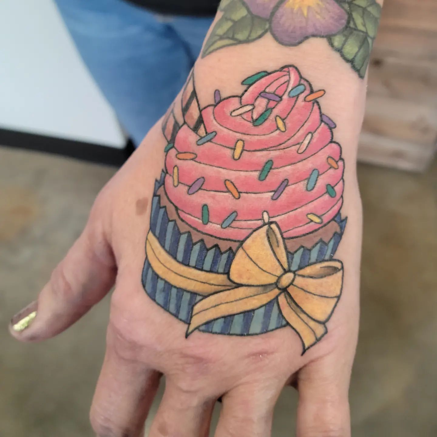 Cupcake Tattoo by Sheila Anderson at Crimson Empire Tattoo in Edmonton Alberta Canada