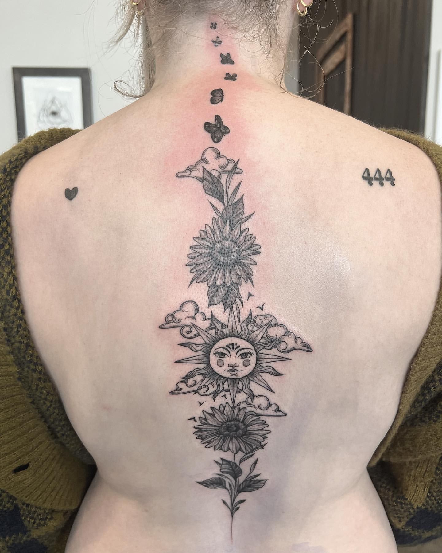 Sun and Floral Back Tattoo by Adrienne Alexander at Silver Ghost Tattoo in Edmonton Alberta Canada