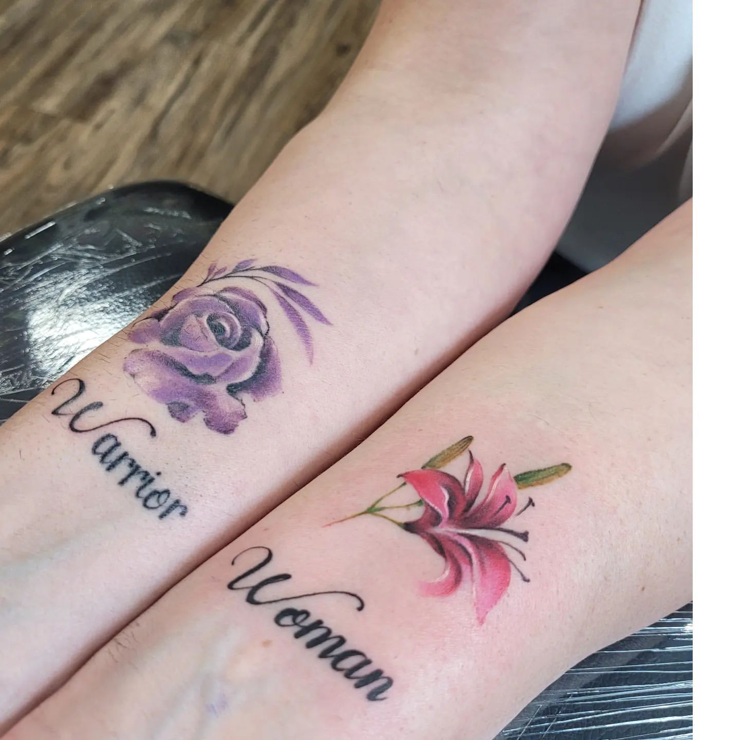Flowers and Writing Tattoo by Ian Wang at Black Gold Tattoo Co in Edmonton Alberta Canada