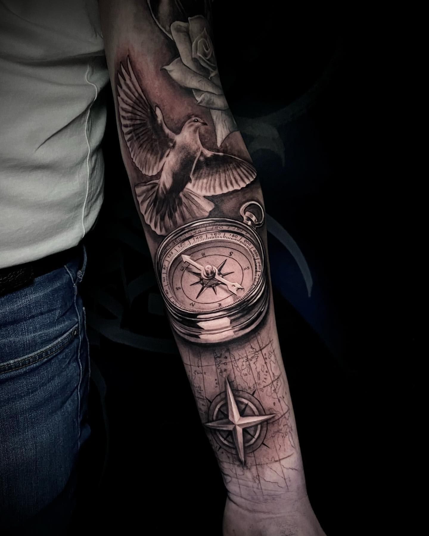 Compass and Dove Tattoo by Jackson Sukhov at Black Gold Tattoo Co in Edmonton Alberta Canada