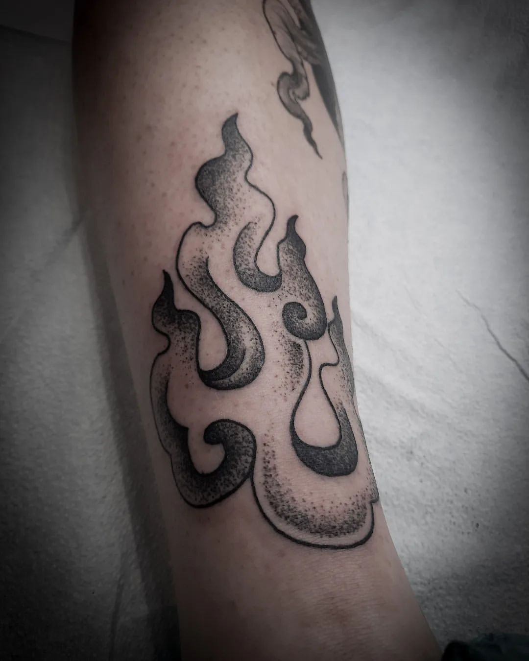 Dotwork Tibetan Flame Tattoo by Alex Arnautov at Black Gold Tattoo Co in Edmonton Alberta Canada