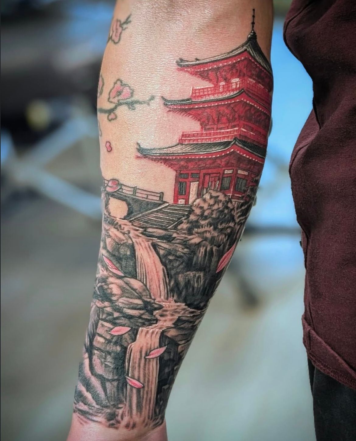 Pagoda and Waterfall by Toby Shipman at Silver Ghost Tattoo in Edmonton Alberta Canada