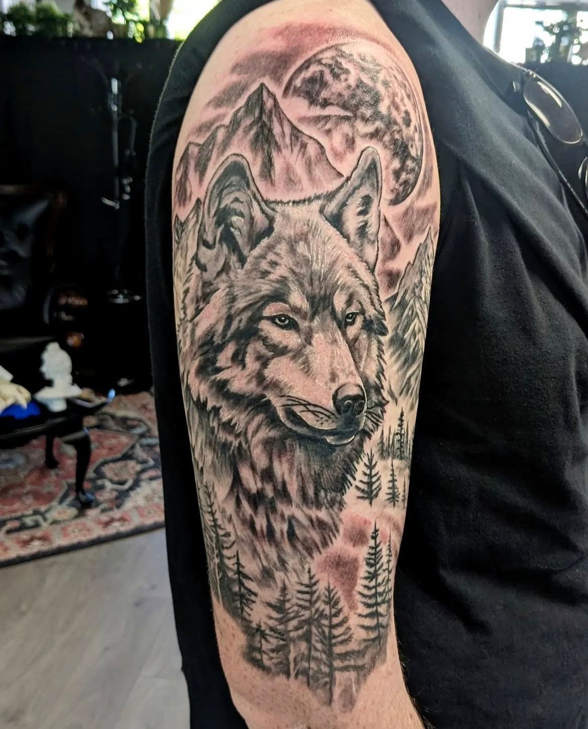 Wolf and Mountains Tattoo by Toby Shipman at Silver Ghost Tattoo in Edmonton Alberta Canada