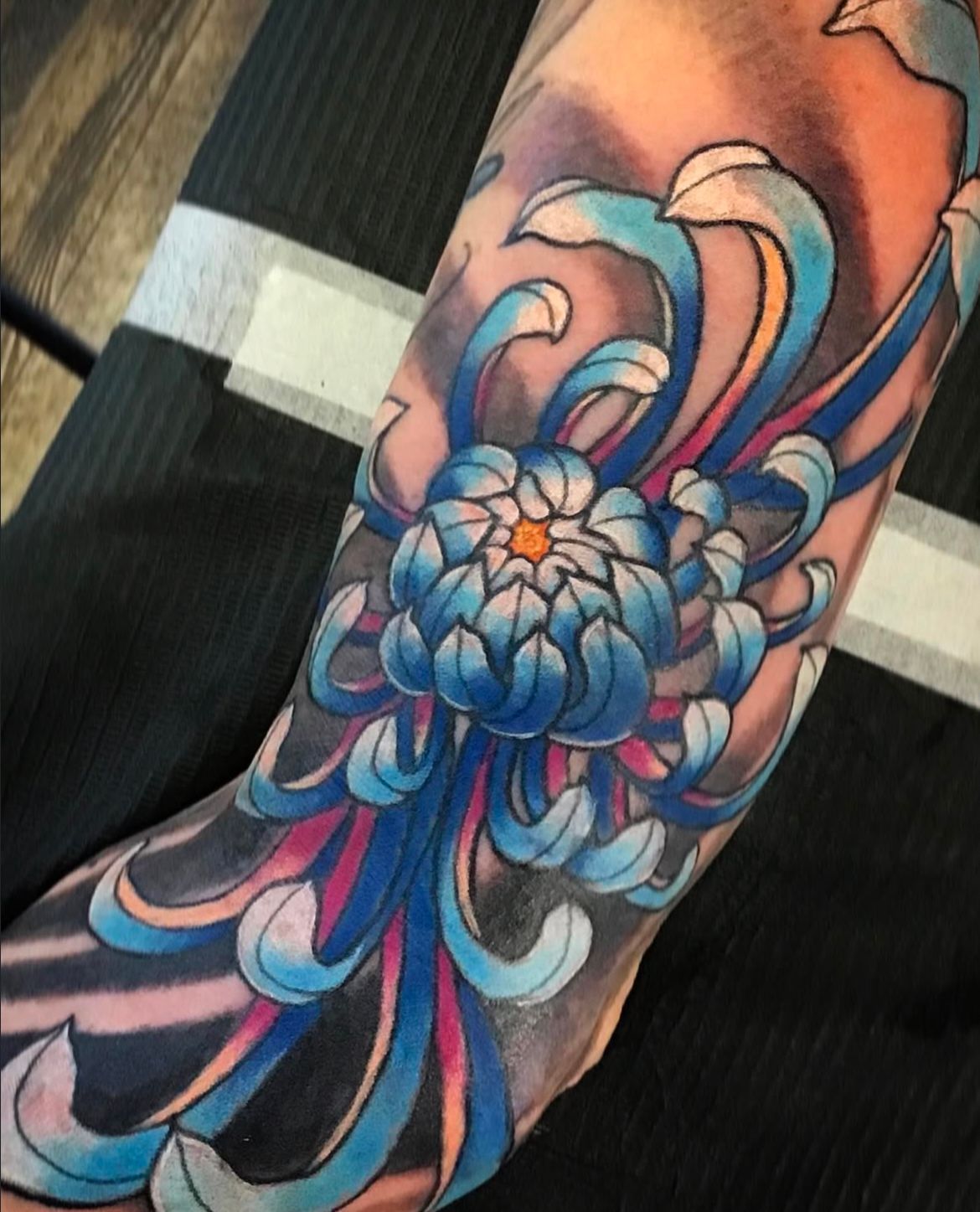Chrysanthemum Tattoo by Toby Shipman at Silver Ghost Tattoo in Edmonton Alberta Canada