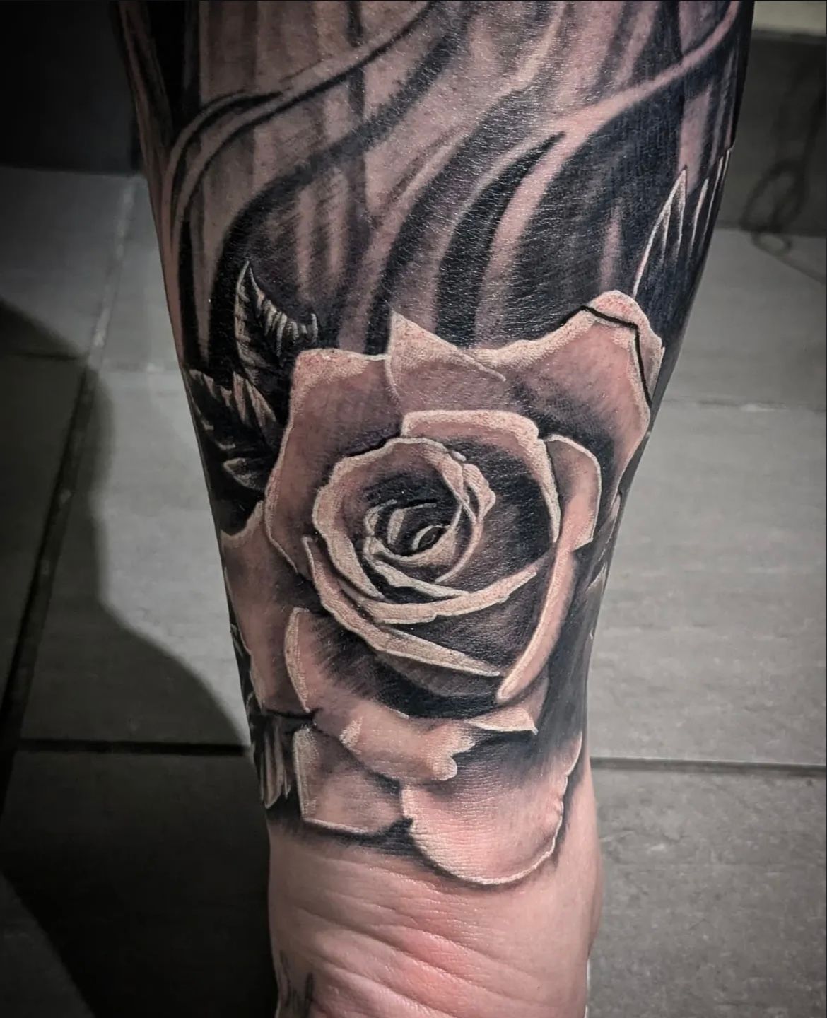 Rose Tattoo by Toby Shipman at Silver Ghost Tattoo in Edmonton Alberta Canada