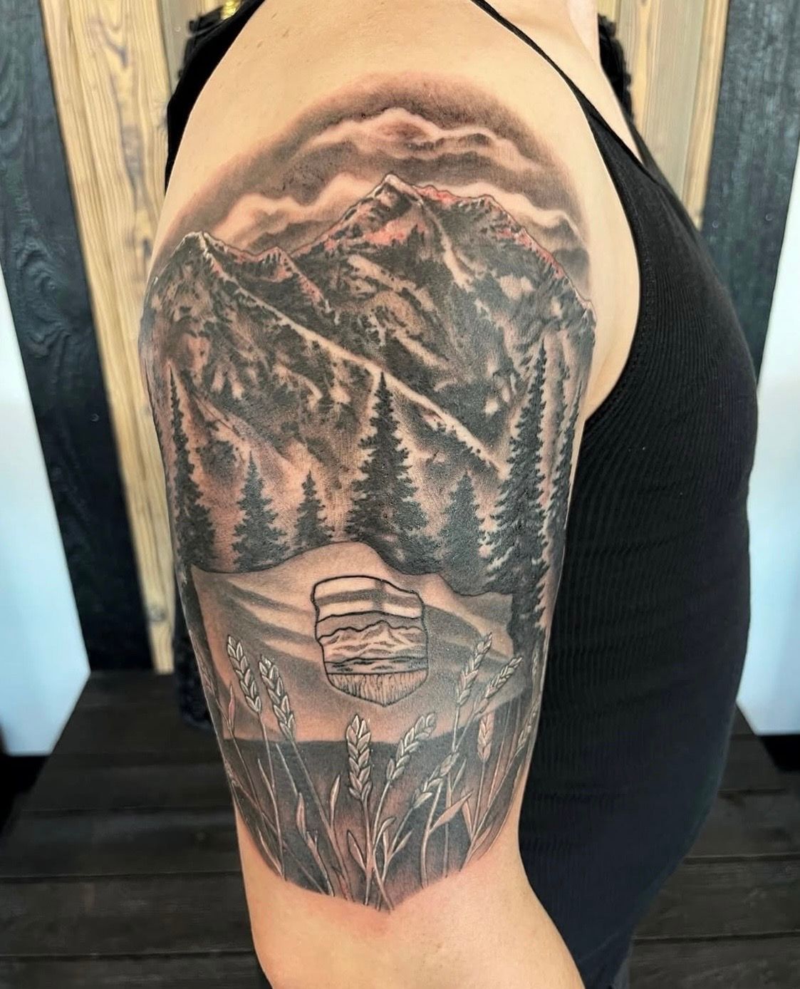 Albertan Mountains Tattoo by Chad Lavers at Crimson Empire Tattoo in Edmonton Alberta Canada