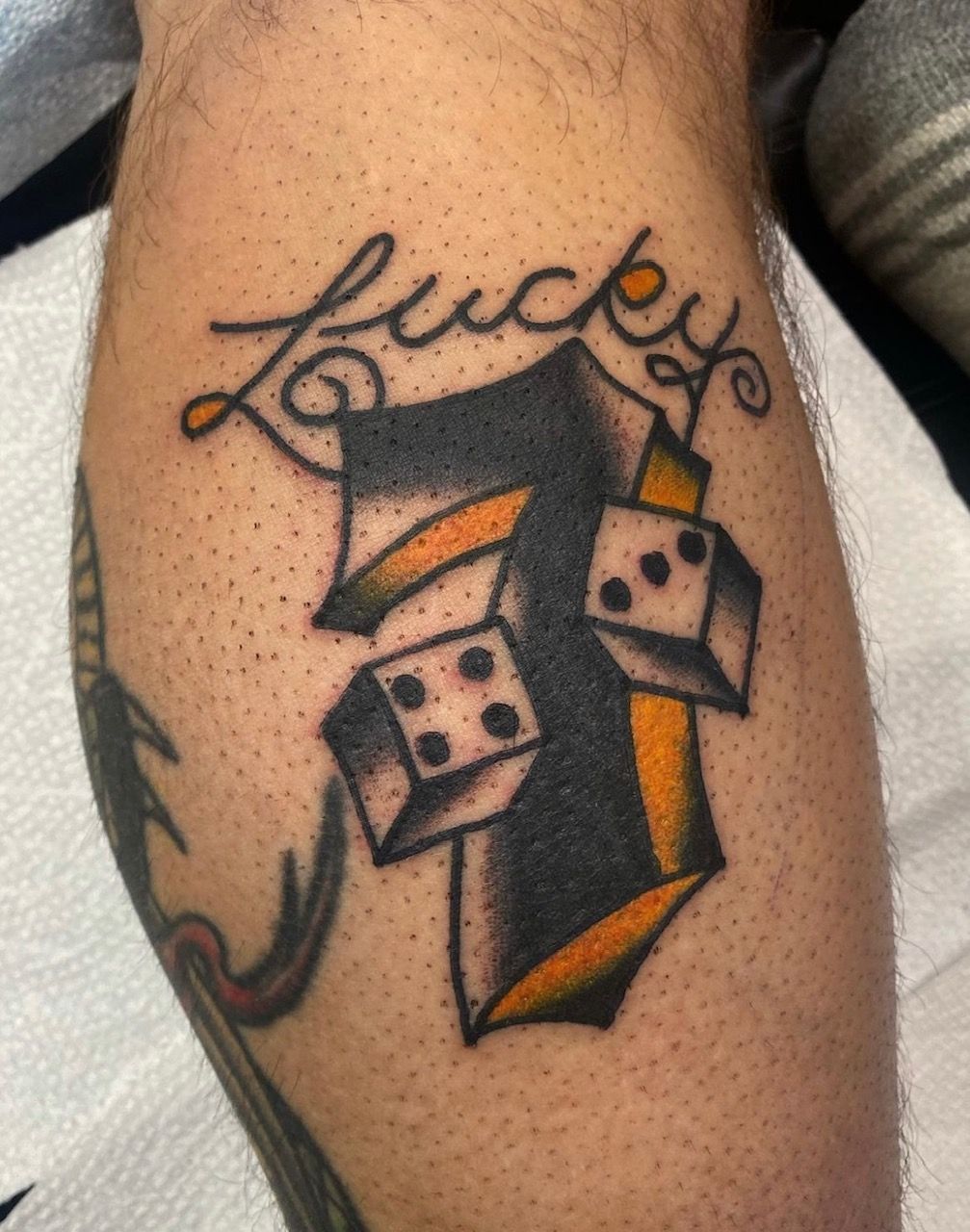 Dice Tattoo by JD Pezderic at Silver Ghost Tattoo in Edmonton Alberta Canada