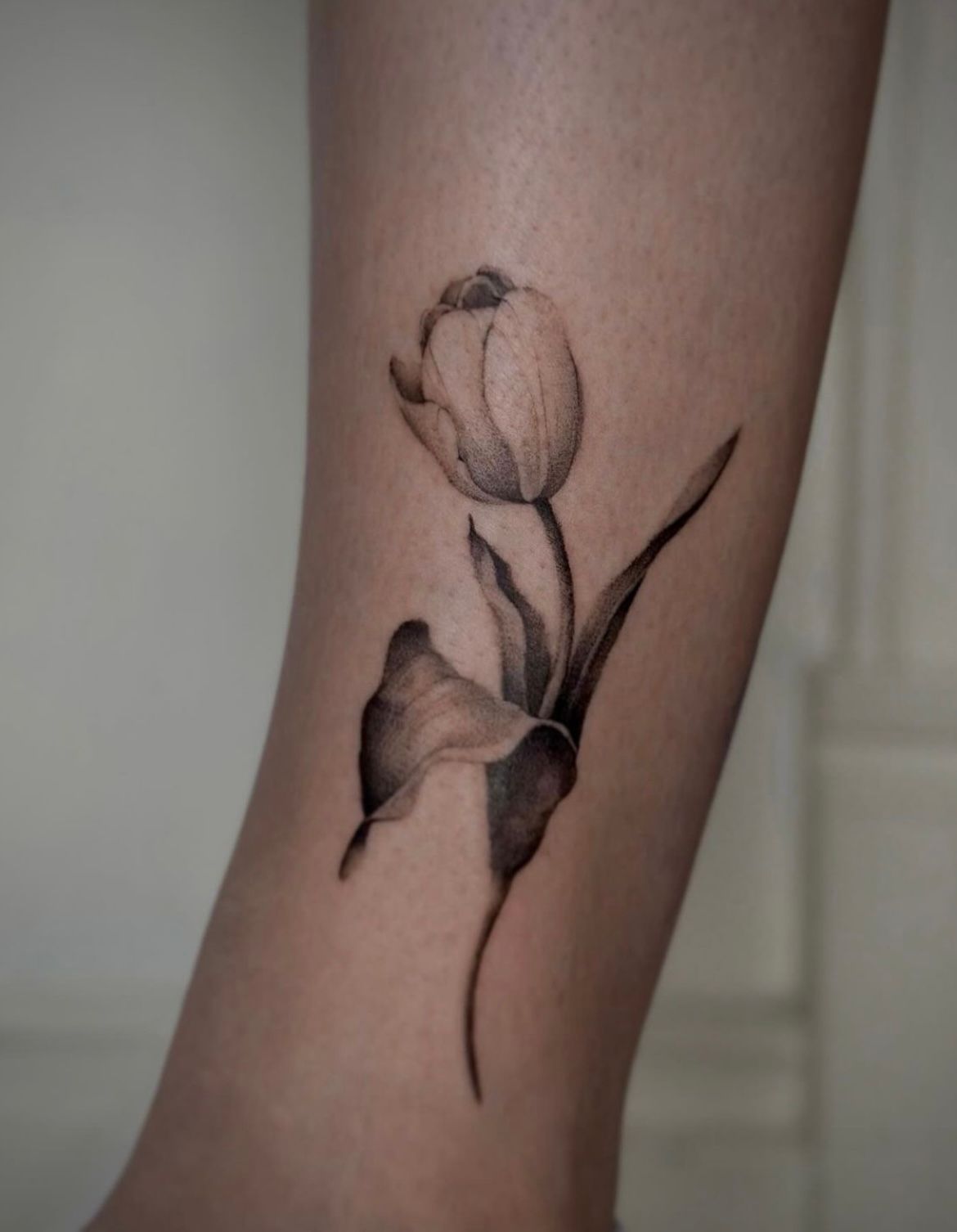 Tulip Tattoo by Anastasiya at Silver Ghost Tattoo in Edmonton Alberta Canada