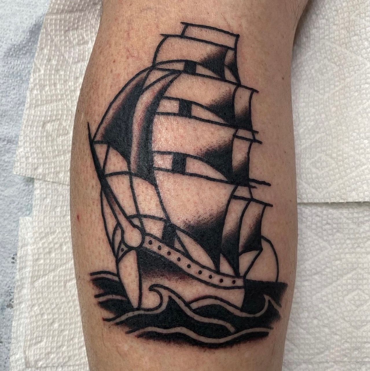 Ship Tattoo by JD Pezderic at Silver Ghost Tattoo in Edmonton Alberta Canada