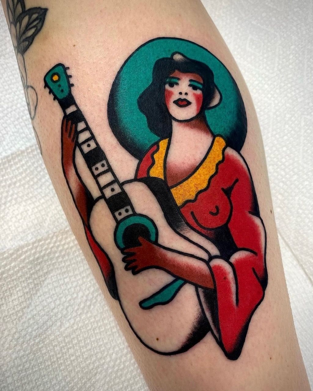 Guitar Lady Tattoo by JD Pezderic at Silver Ghost Tattoo in Edmonton Alberta Canada