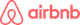 Airbnb logo in coral pink, showing the stylized “A” icon and wordmark on a white background