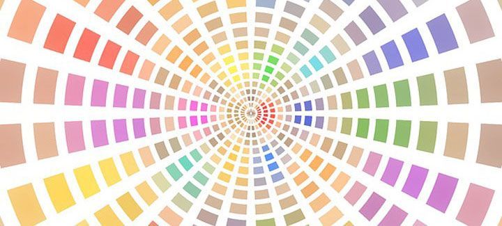 A colorful swirl of squares on a white background.