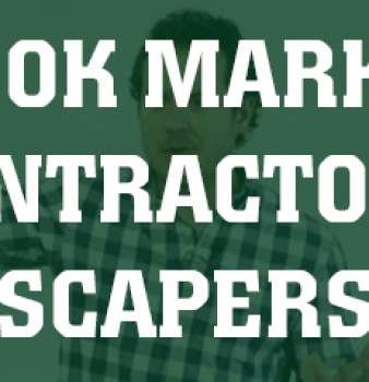 A man in a plaid shirt stands in front of a sign that says ok mari contracto scapers