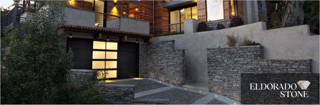 A picture of a house with a sign that says eldorado stone