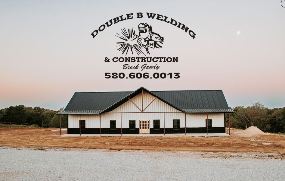Logo of Double B Welding & Construction over a white barn with a black roof and a phone number.