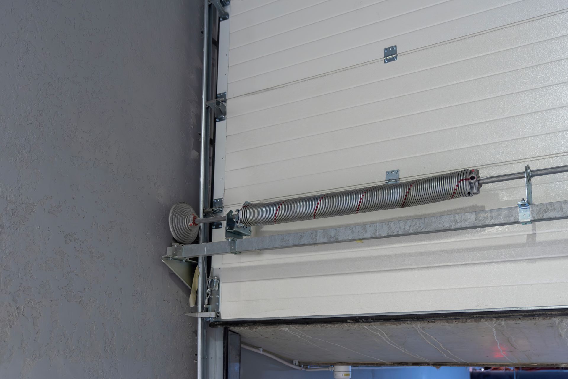 Garage Door Cable Repair for damaged cables and overhead door mechanisms.