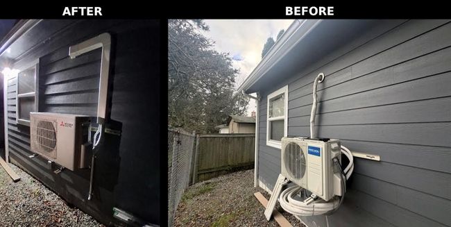 Technician inspecting open furnace with tools in a utility room