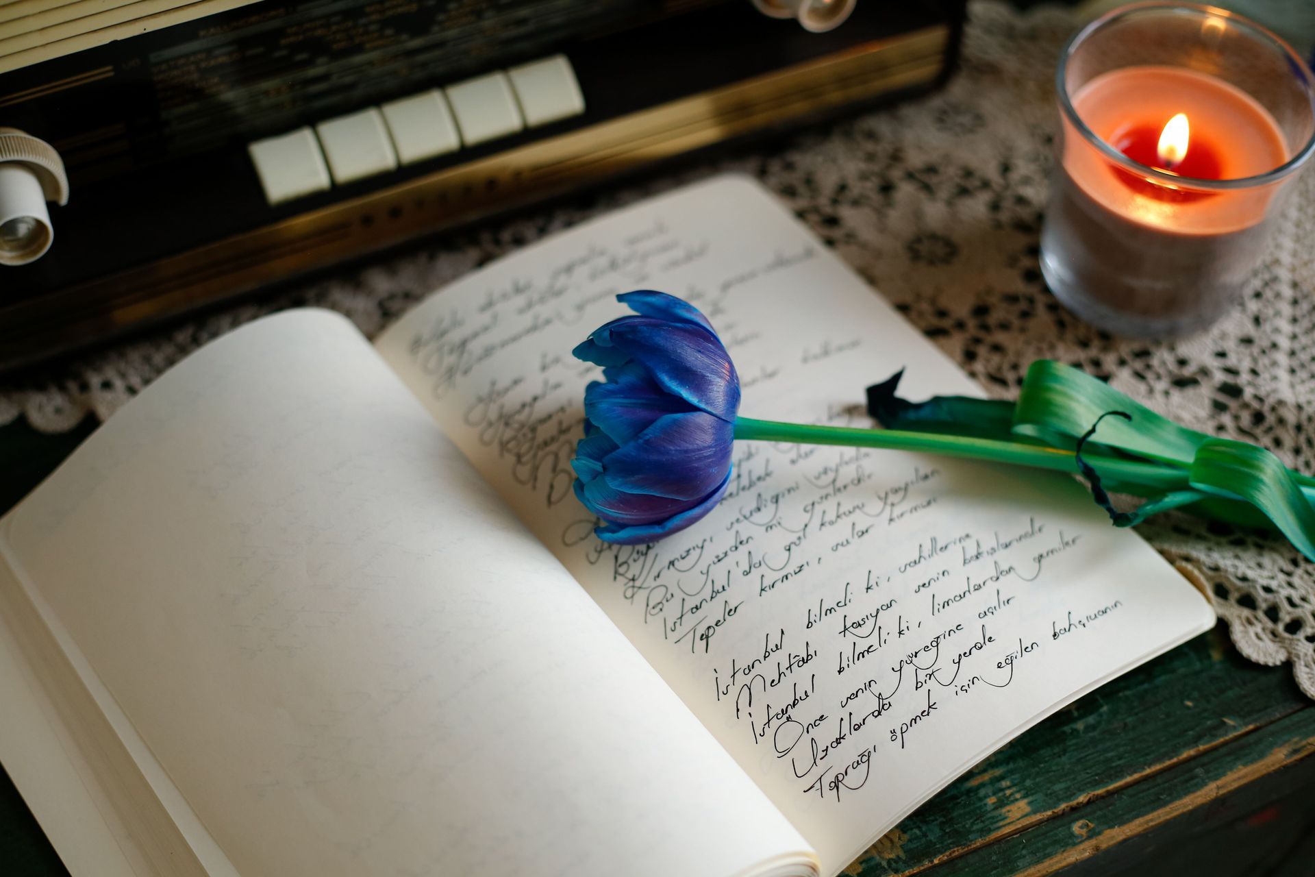 flower on top of handwritten note
